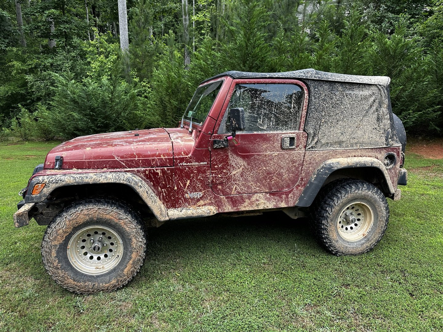 Muddy Jeep after successful trail adventure